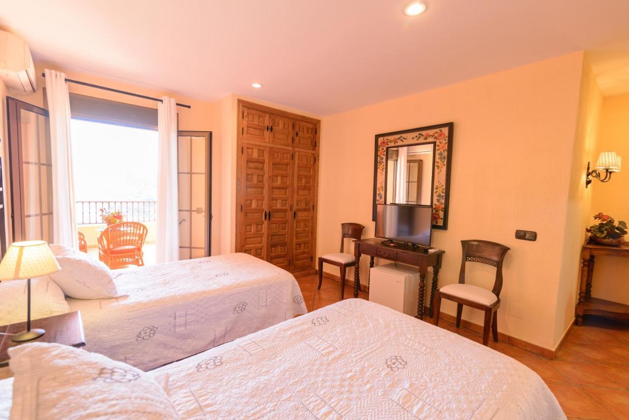 Hotel Rural Sierra Tejeda Alcaucin Bagian luar foto