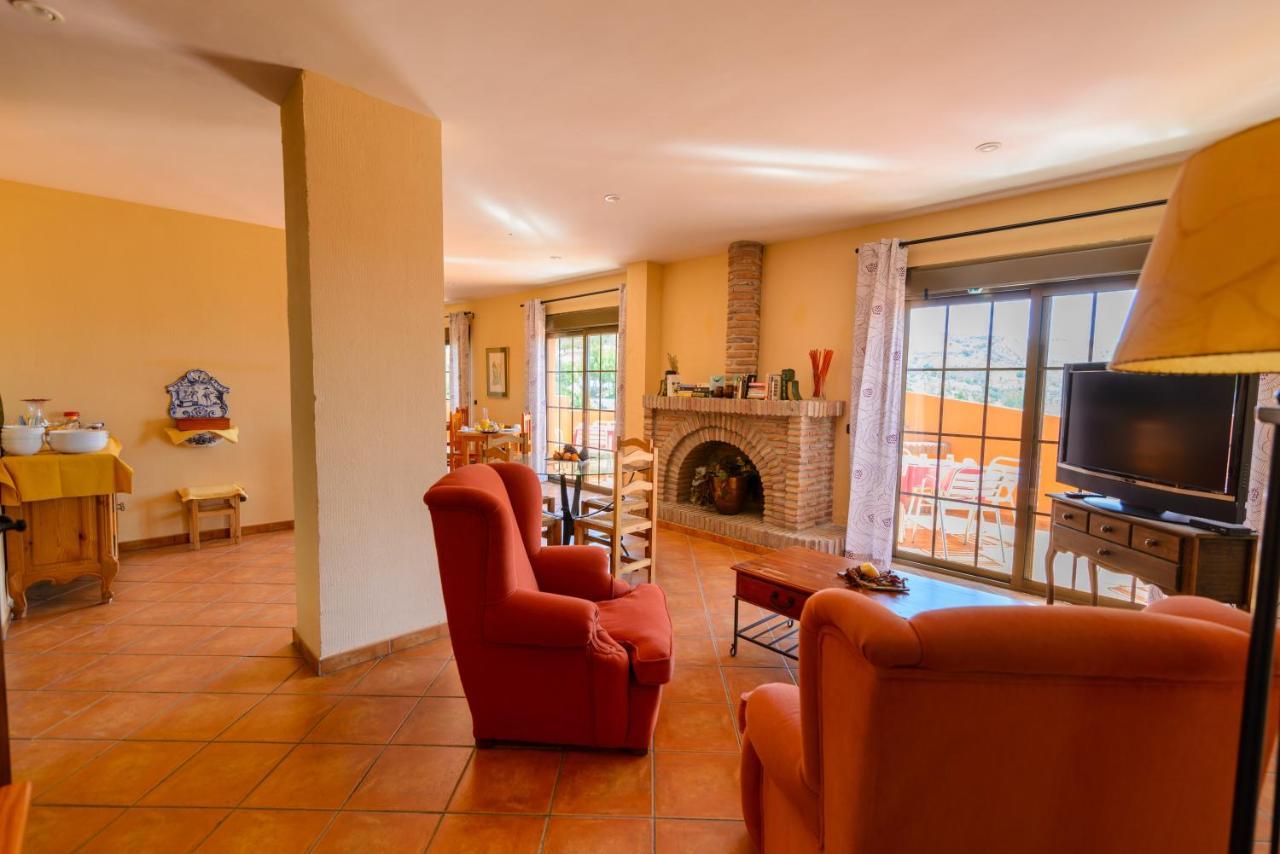 Hotel Rural Sierra Tejeda Alcaucin Bagian luar foto