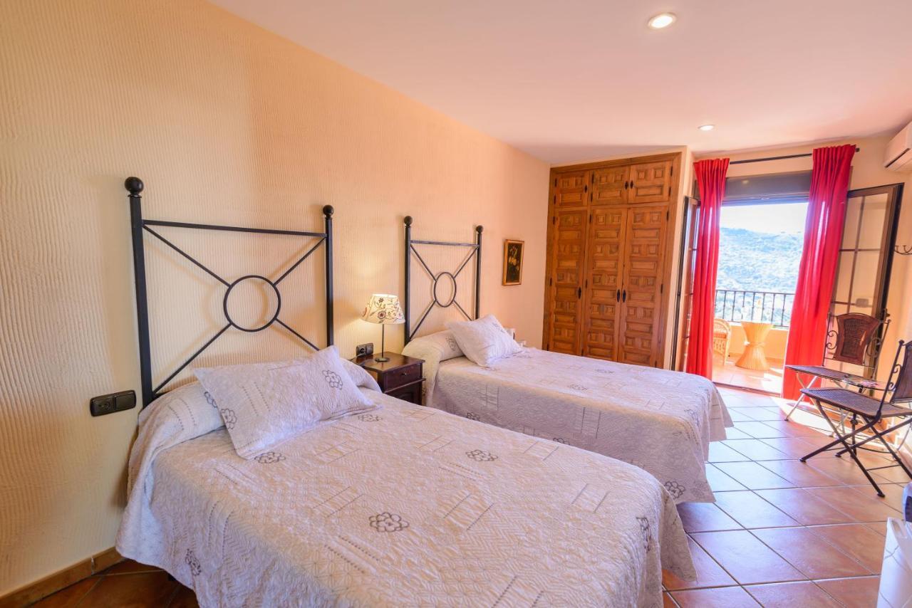 Hotel Rural Sierra Tejeda Alcaucin Bagian luar foto